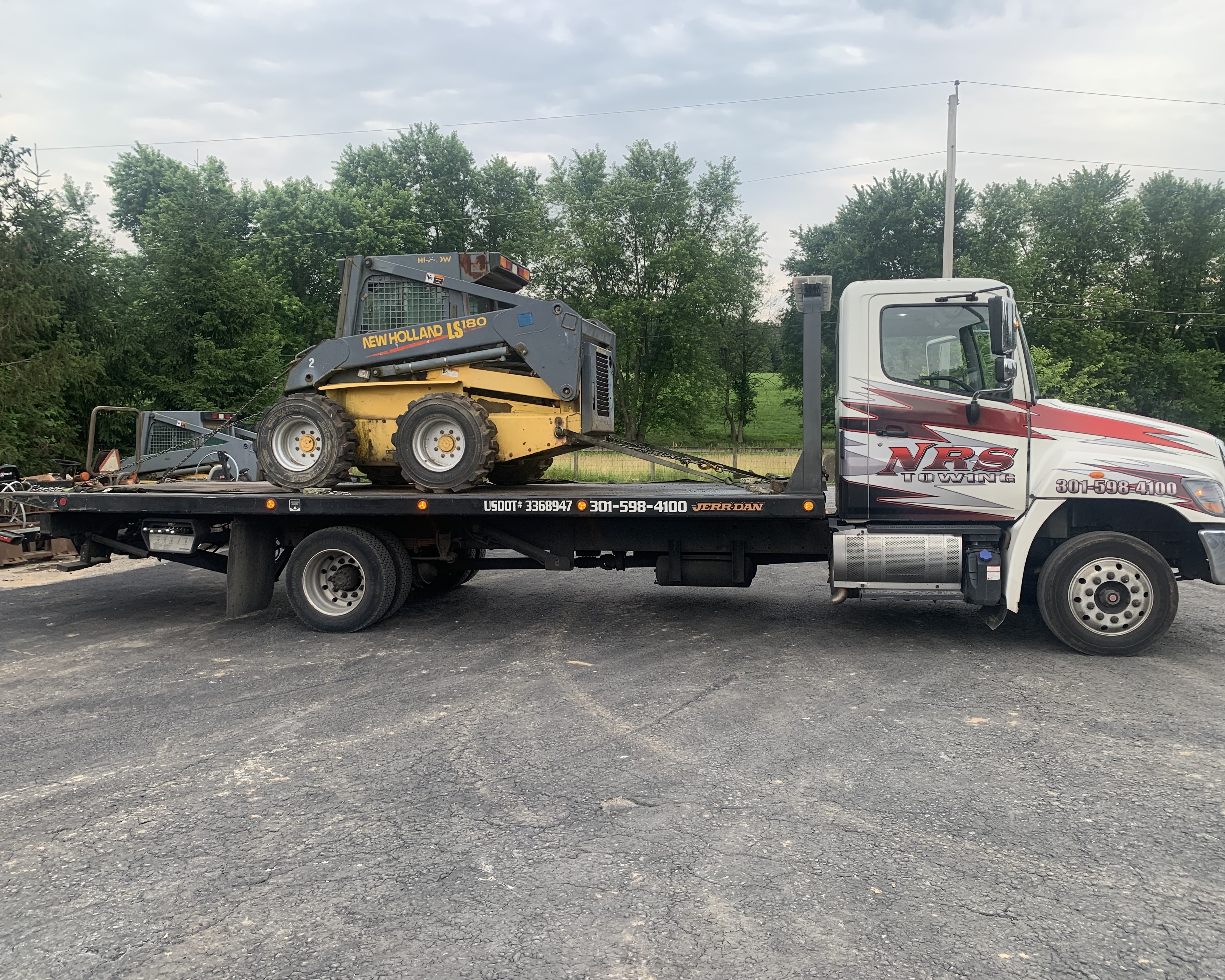 Bulldozer on A Flatbed Tow Truck
